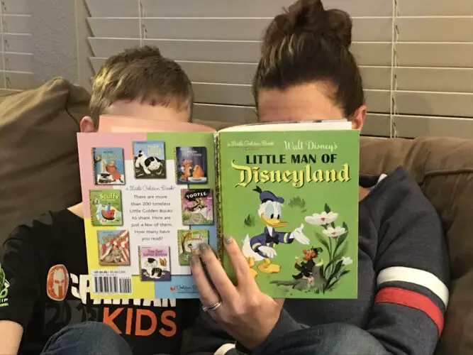 Reading Little Man of Disneyland 